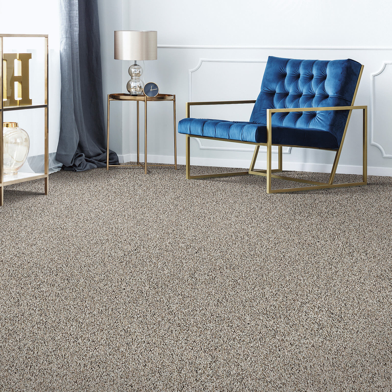 Blue chair on Carpet | C & C Tile & Carpet Co